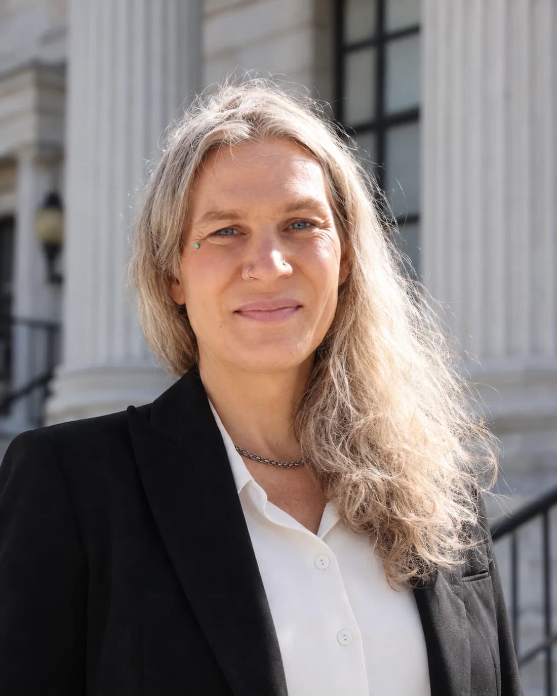 Portrait of Sophia Zoë Kilmer outside the courthouse